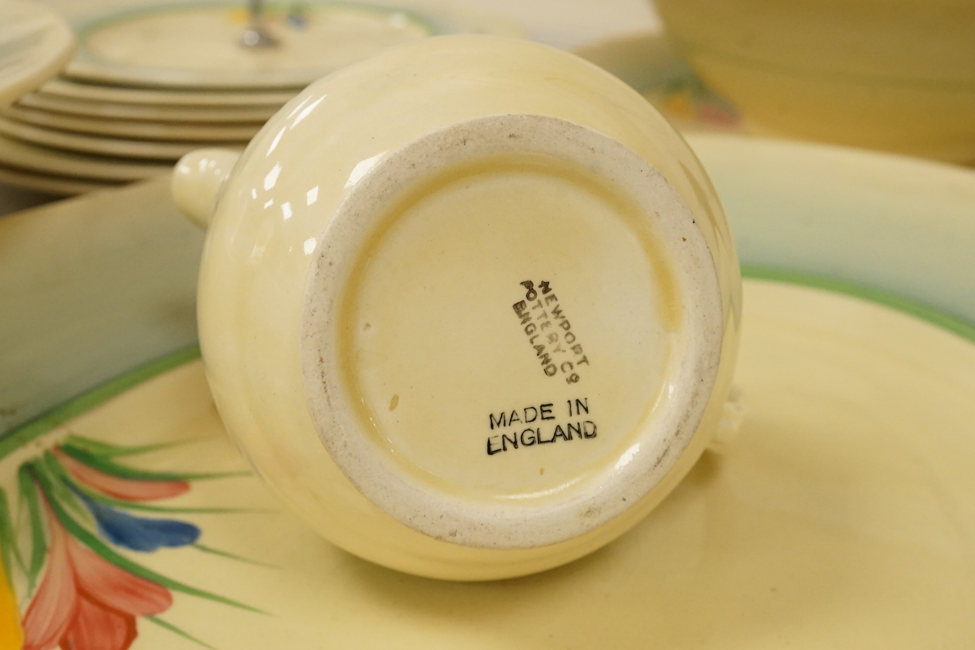 A collection of Clarice Cliff, Newport Pottery and Spring Crocus pattern tableware